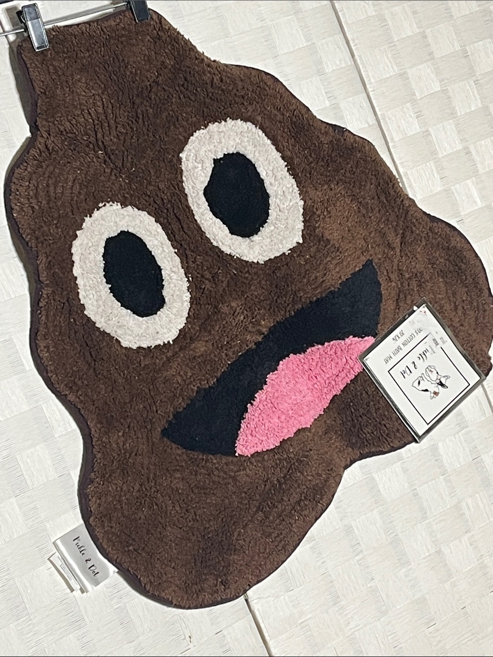 Plush Brown Smiling Poop Emoji Bath Mat with Pink Tongue